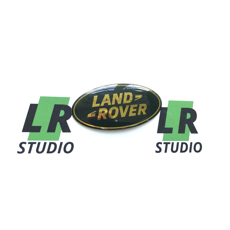 Эмблема Land Rover зеленая с золотом 86мм