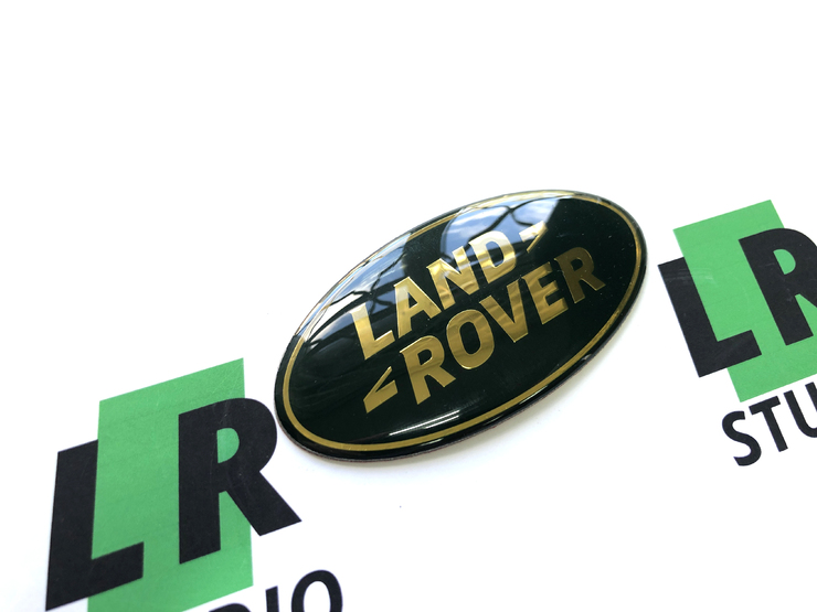 Эмблема Land Rover зеленая с золотом 86мм