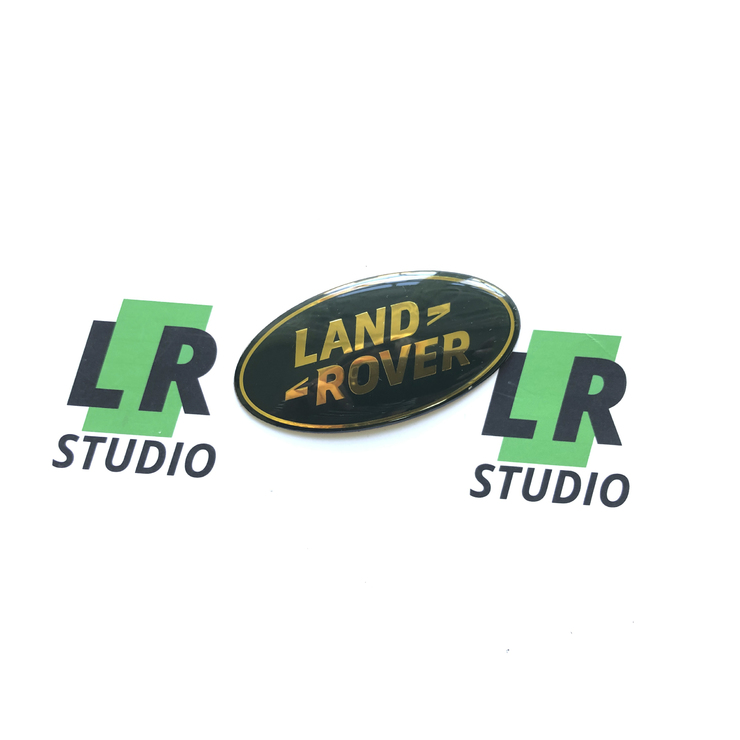 Эмблема Land Rover зеленая с золотом 86мм